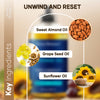 Infographic showing key natural ingredients: Sweet Almond Oil, Grape Seed Oil, and Sunflower Oil.