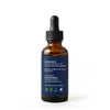 Nexon Botanics Organic Helichrysum Essential Oil amber glass bottle back label showing 100% pure ingredients, sourcing, and certifications.